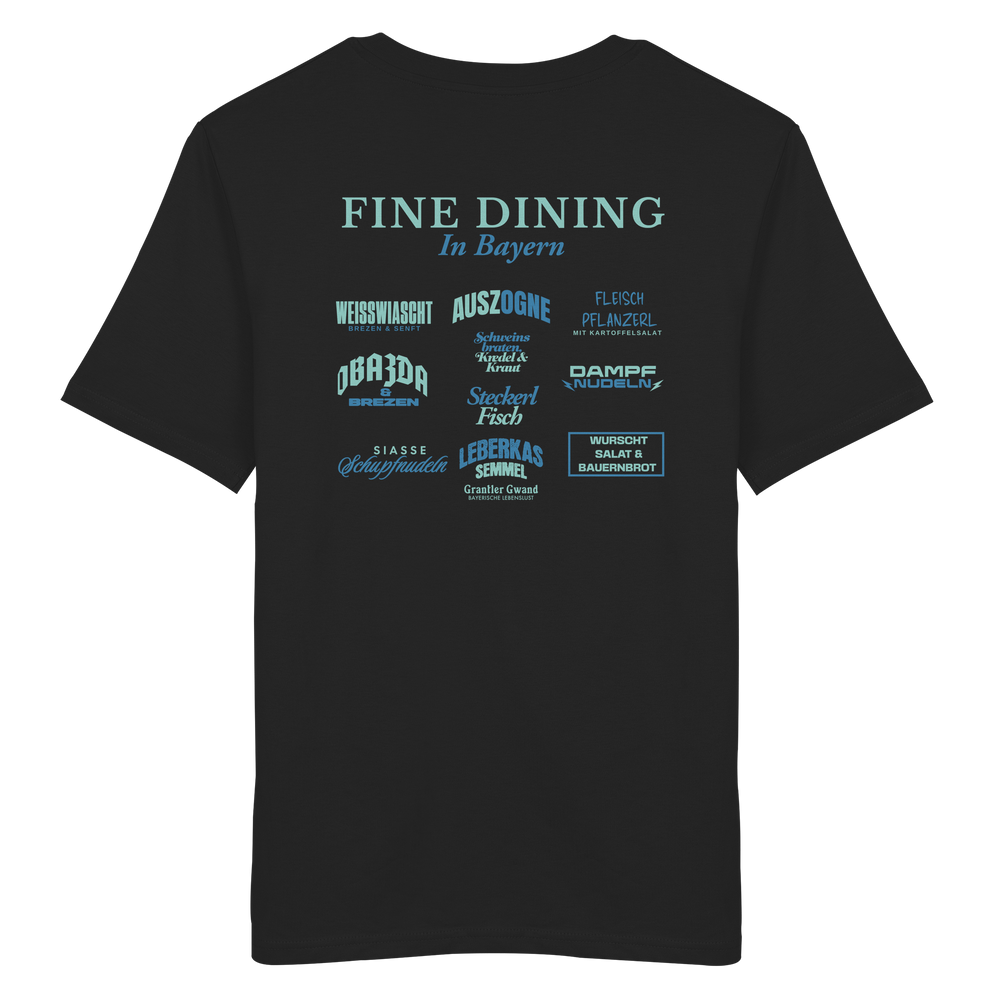 Schwarzes Unisex T-Shirt mit grünem „Fine Dining in Bayern“-Backprint – bayerische Streetwear mit typografischem Motiv rund um Leberkas, Brezen, Dampfnudeln und weitere Klassiker der bayerischen Küche.