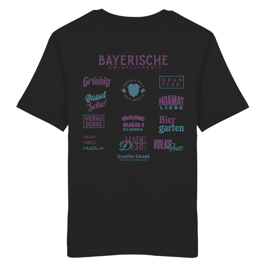 Schwarzes Unisex T-Shirt mit großem lila Backprint „Bayerische Gmiatlichkeit“ und typischen bayerischen Begriffen wie Hoamatliebe, Biergarten, Volksfest, Grantler, Hopfen &amp; Malz und Griabig. Unisex Premium-T-Shirt aus ringgesponnener Baumwolle im modernen Streetwear-Style. Designed und bedruckt in Bayern von Grantler Gwand.