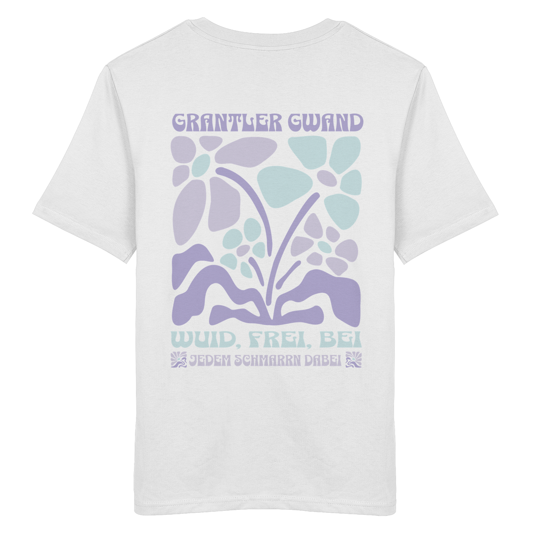 Weißes unisex Shirt mit großem Retro-Blumen-Backprint und dem bayerischen Schriftzug „Wuid, Frei, Bei Jedem Schmarrn Dabei“ von Grantler Gwand.
