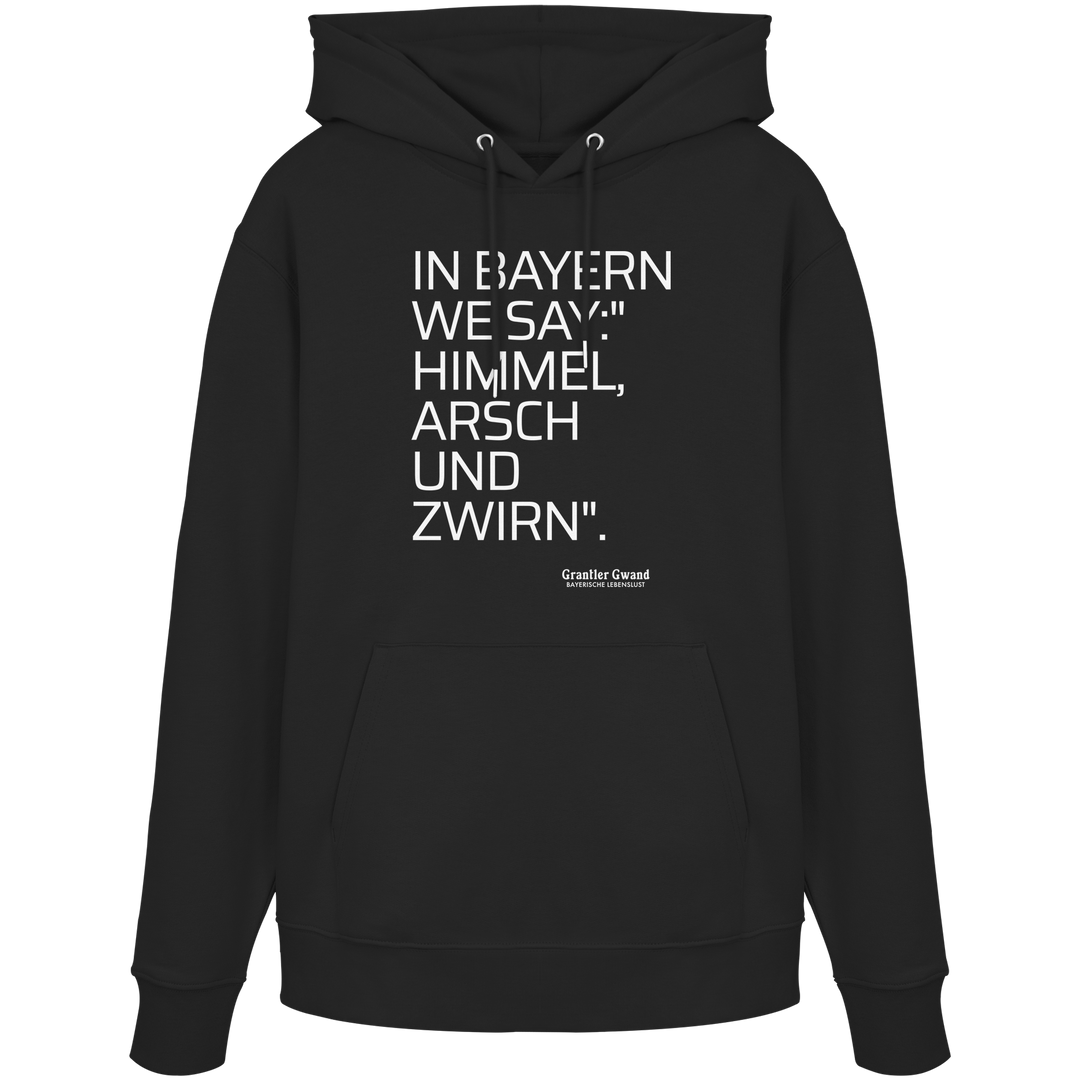 Schwarzer Hoodie mit weißem Schriftzug „In Bayern we say: Himmel, Arsch und Zwirn“ auf der Vorderseite von Grantler Gwand.