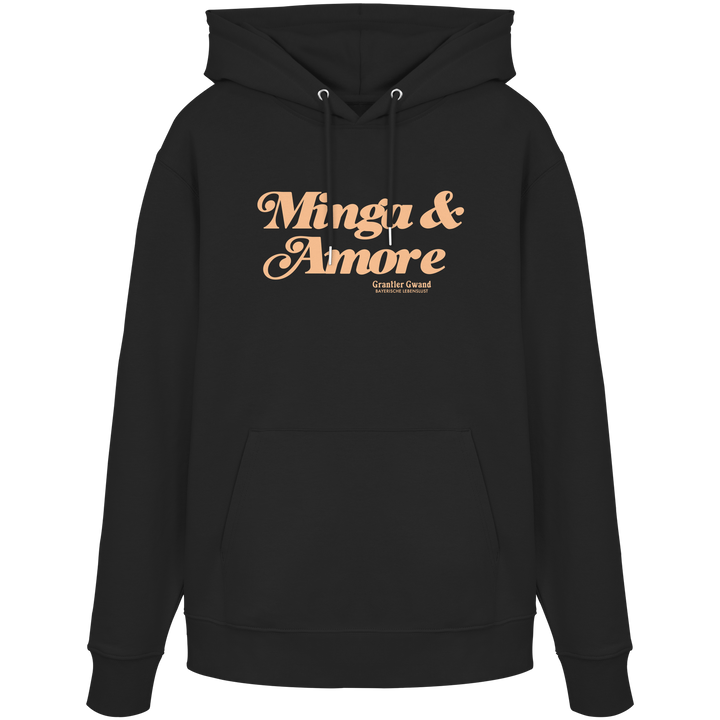 Schwarzer Unisex Hoodie von Grantler Gwand mit apricotfarbenem Frontprint „Minga &amp; Amore“ im Retro-Schriftzug – bayerischer Streetwear Hoodie für Alltag, Biergarten und München.