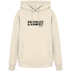 Beiger Hoodie mit schwarzem Frontprint „Gschneizt & Kampelt“. Moderner Unisex-Hoodie mit bayerischem Dialekt im minimalistischen Streetwear-Design für Volksfest, Biergarten und Alltag. Hochwertige Qualität, designed und bedruckt in Bayern von Grantler Gwand.