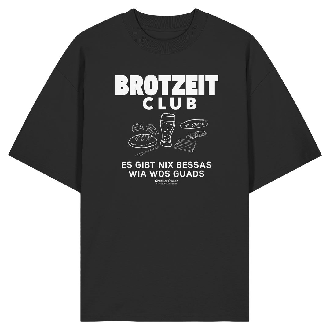 Schwarzes Oversize T-Shirt von Grantler Gwand mit weißem Frontprint „Brotzeit Club“ und handgezeichneten Brotzeit-Motiven – bayerisches Streetwear Shirt aus Bio-Baumwolle.